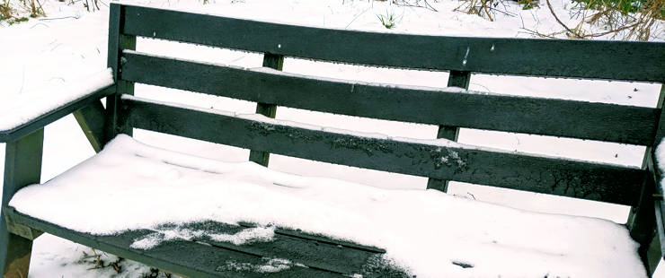 Melting snow on a bench