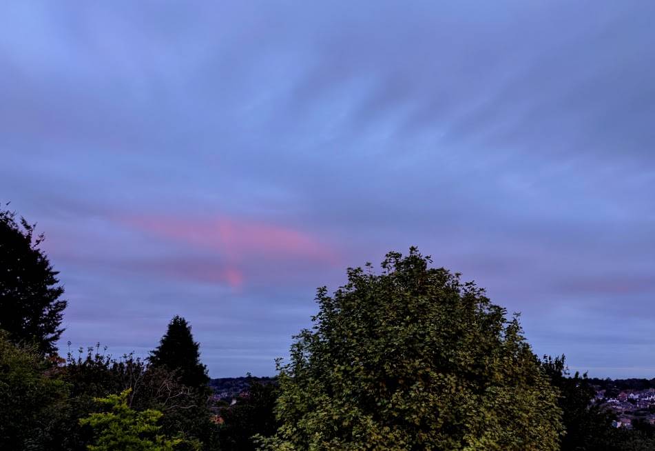 Spooky sky over Berko. notice the vertical orange streak near the middle. Berkhamsted, Hertfordshire,United Kingdom, sent by brian gaze