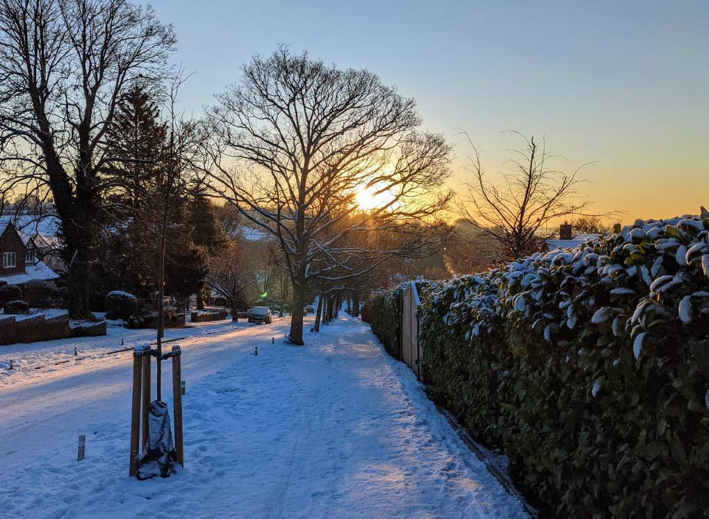 Berkhamsted, Herts, Iced up road and snow at sunrise...