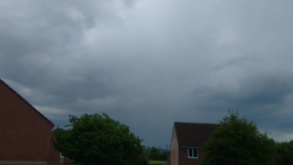 Passing thundery shower ti the south Bridgwater, Somerset,UK, sent by davetoonmaniac