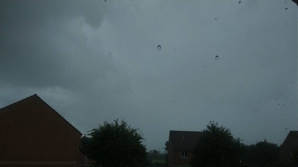 Heavy shower passing over Bridgwater, Somerset,United Kingdom, sent by davetoonmaniac