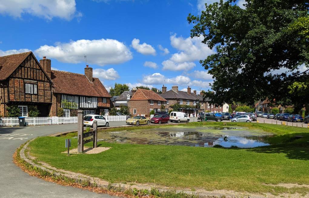 Aldbury, Herts, Aldbury stocks and village pond...