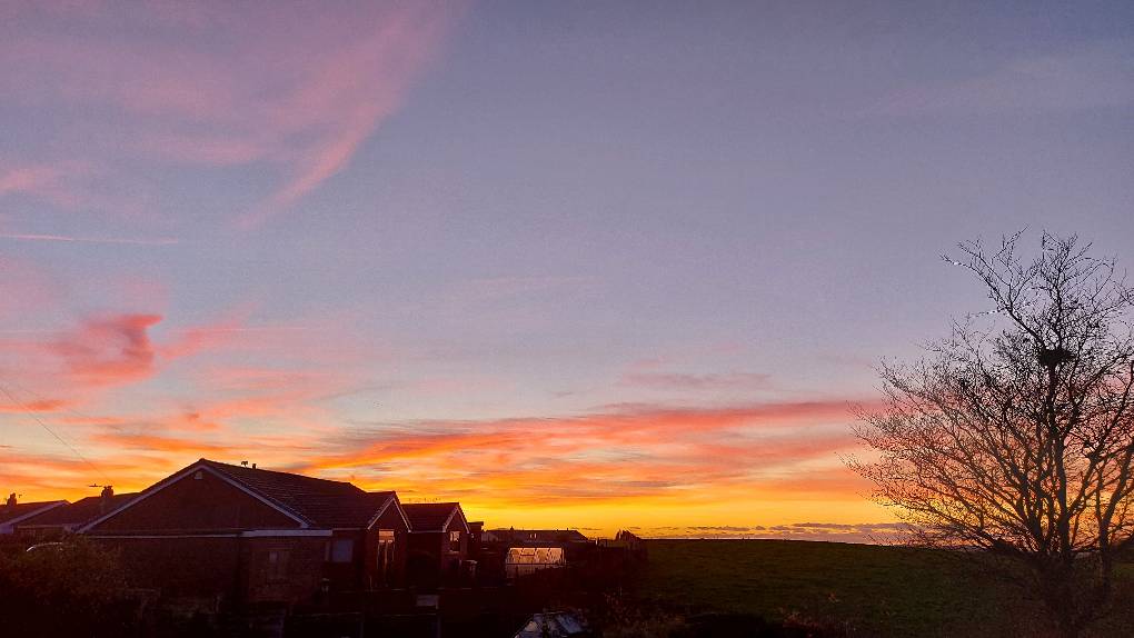 Blackrod, Lancashire, Quick phone pic of a red sunset over the field, after a sunny but cold day....