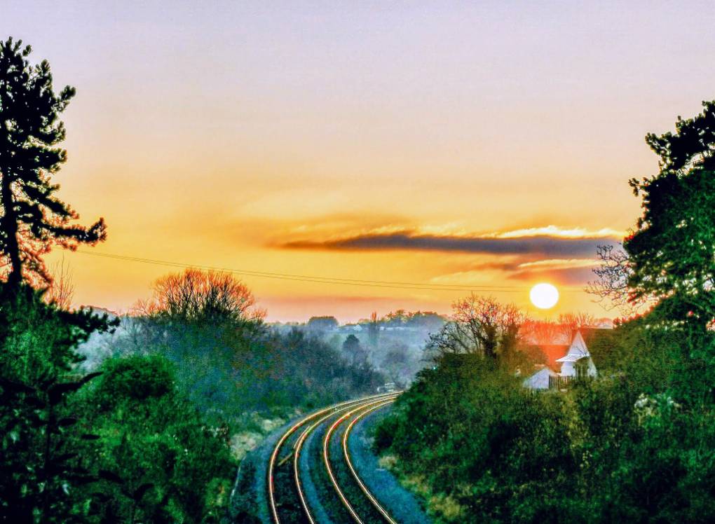 Sunset over the railway Somerton, Somerset,UK, sent by glynnadams68
