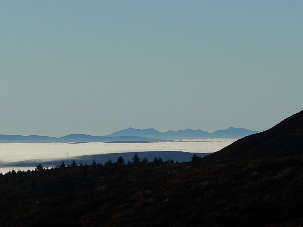 Stirling, Stirlingshire, Isle of Arran above inversion - 91km, 56 miles...