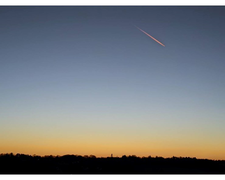 Contrail shortly after sunset. Posted by brian gaze