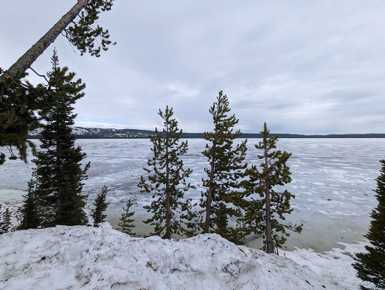 Snow and frozen West Thumb Lake in Yellowstone National Park, May 27th, 2023 Grant Village, Wyoming,USA, sent by Brian Gaze