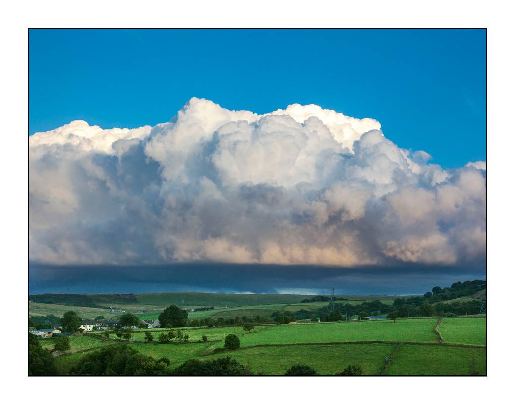 Shower cloud over the West Yorkshire Pennines Halifax, West Yorkshire,UK, sent by bobcollier