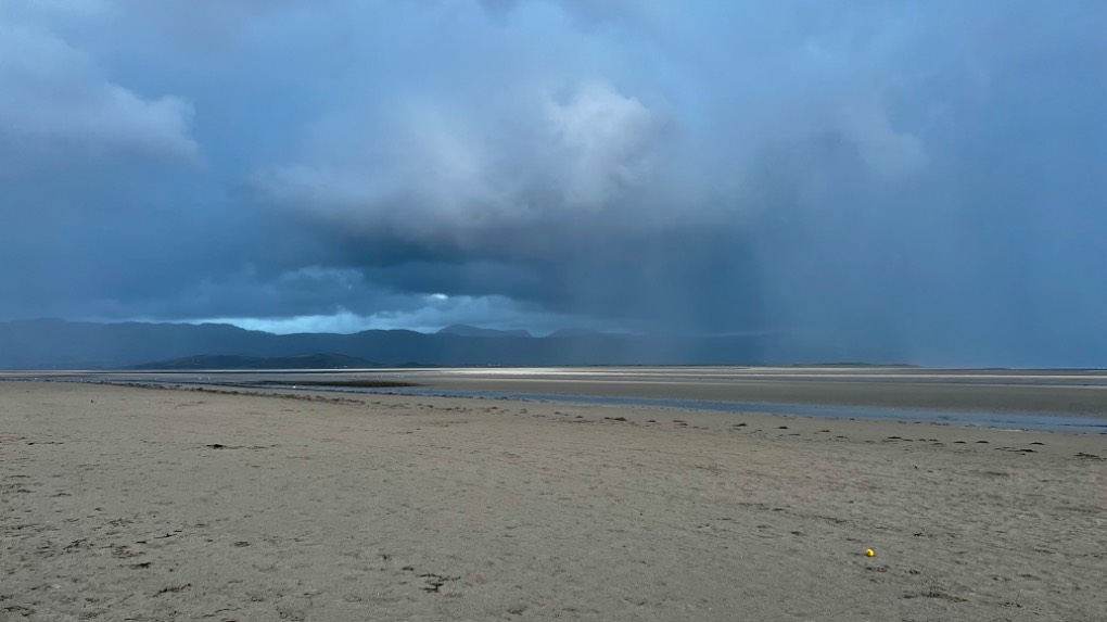 Heavy showers passing black rock sands. Porthmadog, ,Wales, sent by toppiker60