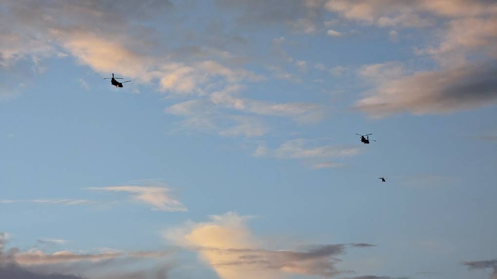 Berkhamsted, Hertfordshire, A rare sighting around here. Two Chinooks and another smaller helicopter. ...