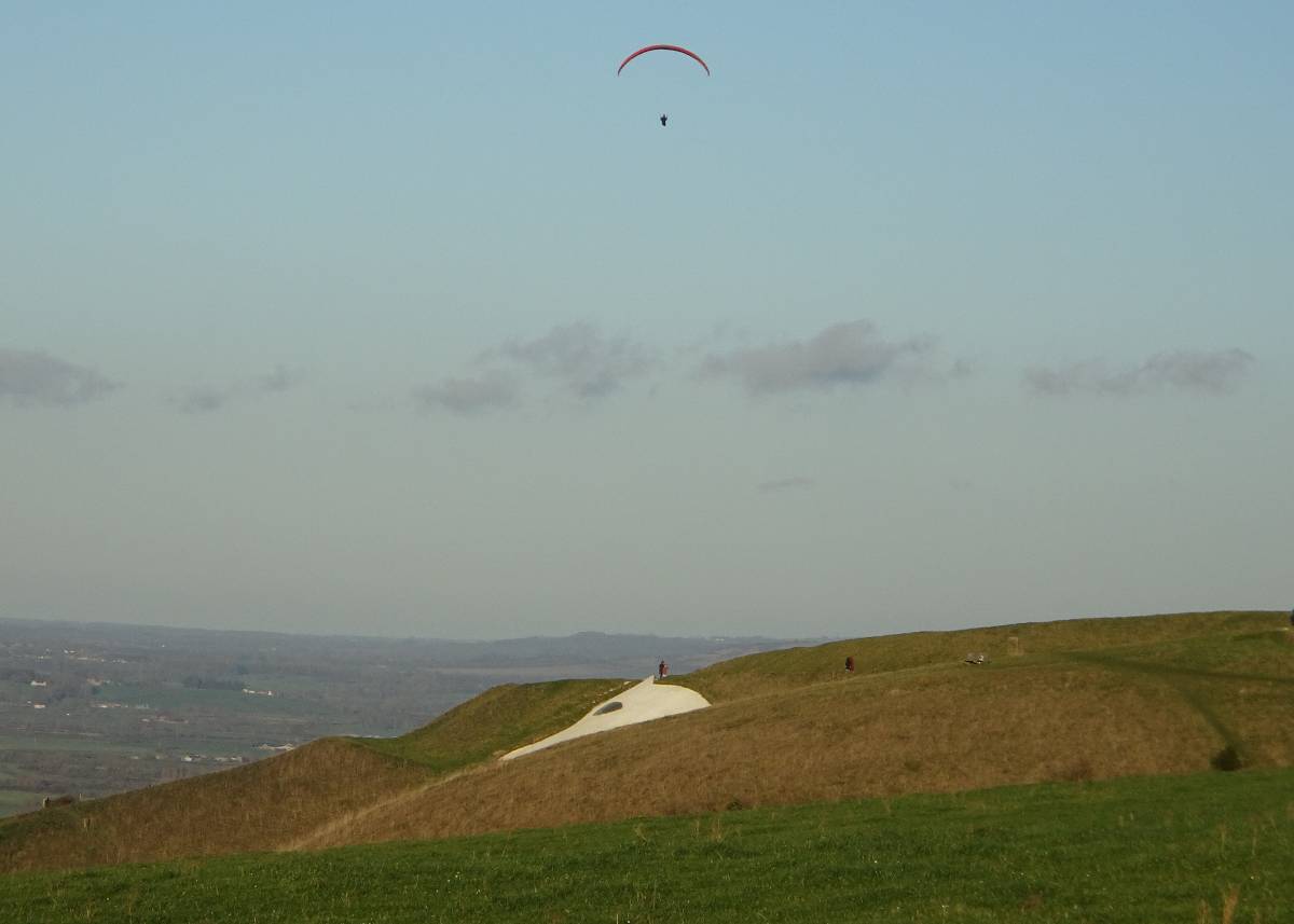Westbury, Wilts, Hang glider over White Horse: S wind over N-Facing scarp, Salis Plain, 2 Ja...