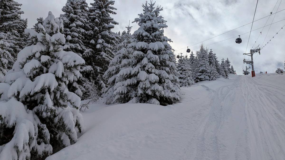 , , Approaching the top of the Granges button lift with the Ariondaz gondola in...