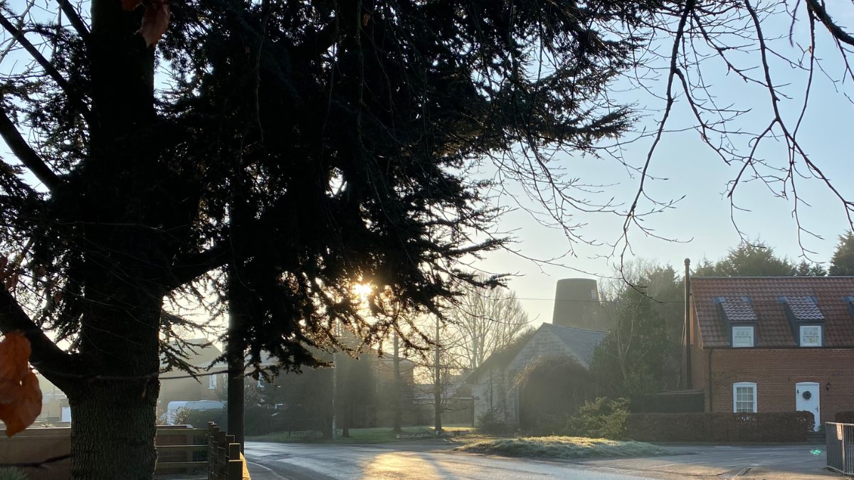 SPALDING, Lincolnshire, Windmill house in the frosty, morning mist. ...
