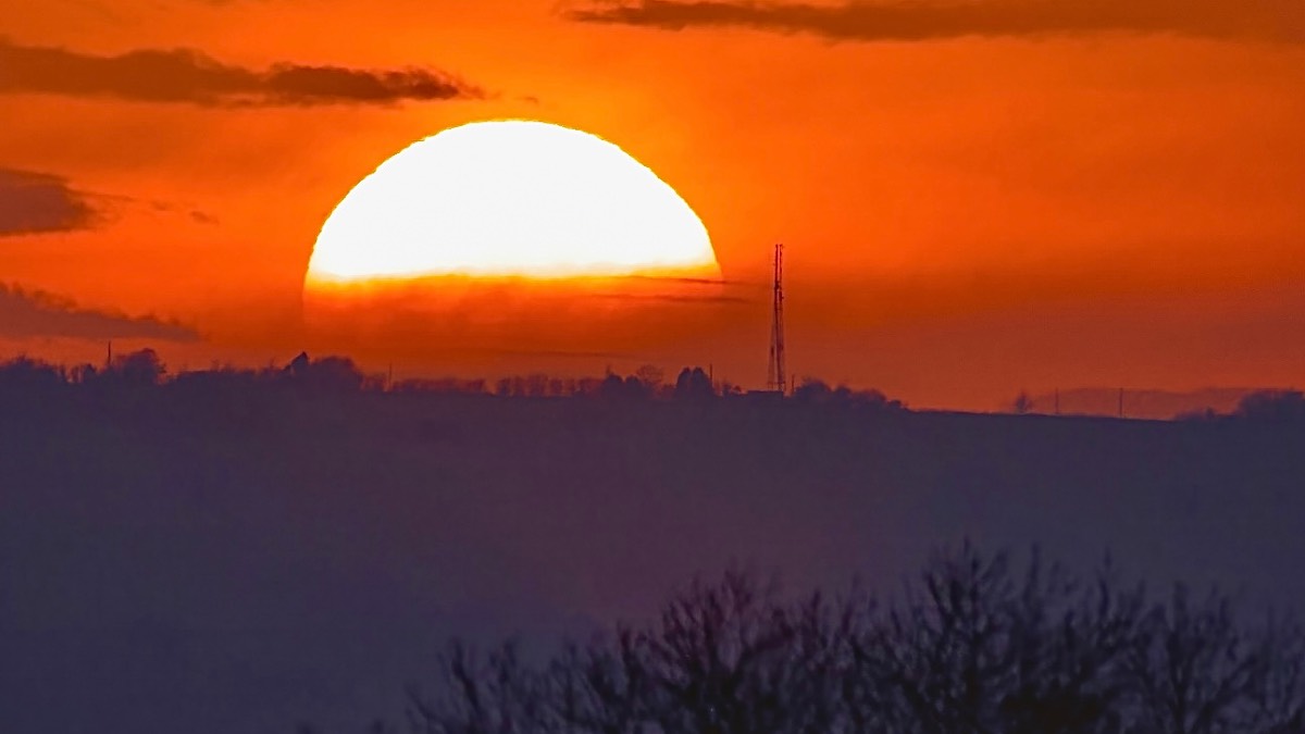 Leek, Staffordshire, sun appeared at sunset after a mostly cloudy but warm day ....