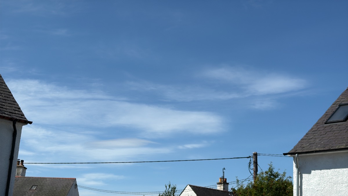 Grantown on Spey, Highlands, A vapour trail through the clouds, maybe?...