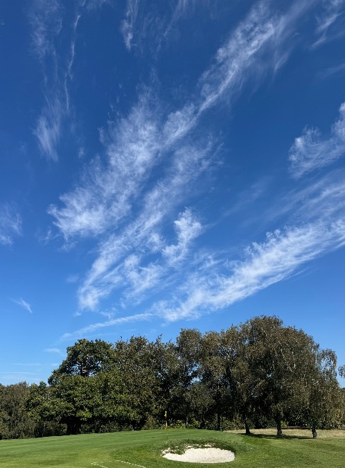 Midhurst, , Change on the way. Cirrus uncinus over Cowdray Park Golf Club...