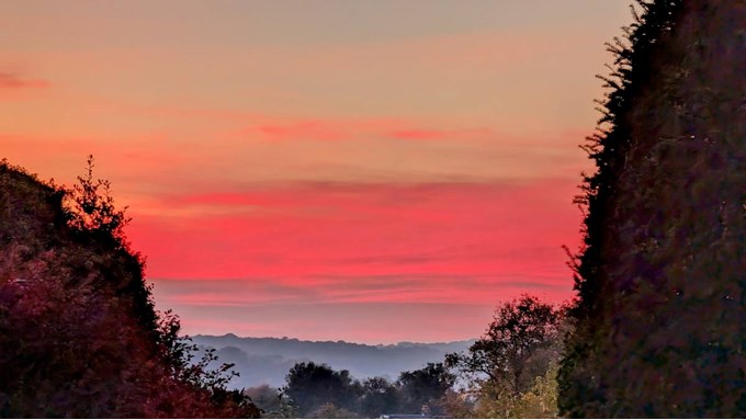 Fierce red sky around sunset. Posted by Brian Gaze