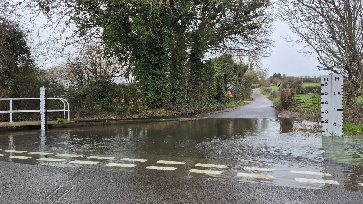 Stockbridge, Hampshire, The Somborne in full flow now the groundwater has reached the surface...