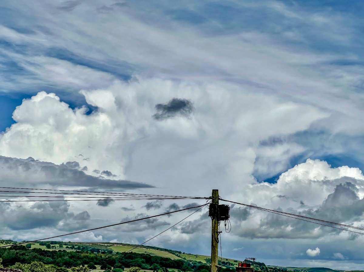 Leek, Staffordshire, Showers growing fast in the strong sunshine....