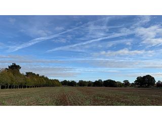 Rain clearing southeastwards